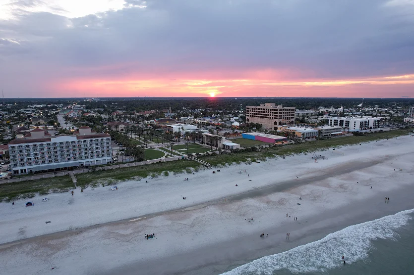 Aerial views from over Jacksonville Beach Florida at Sunset