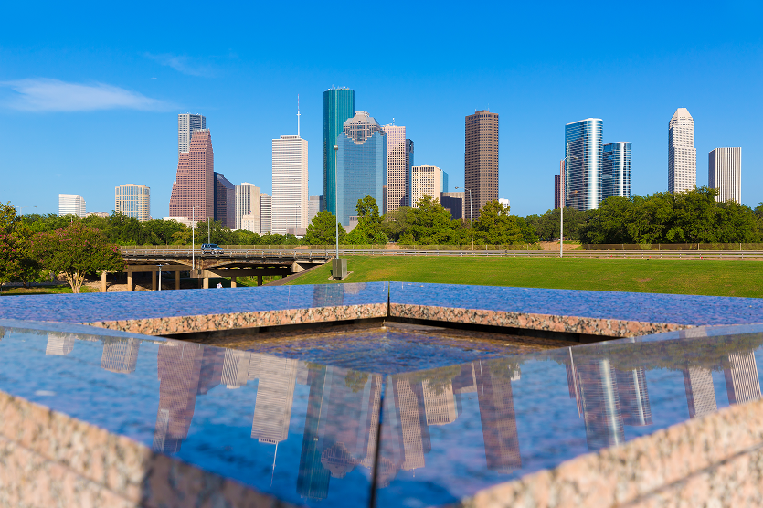 Houston skyline and Memorial reflection – best home insurance in Texas.